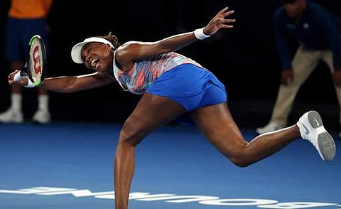 United States' Venus Williams tries to make a return to Switzerland's Belinda Bencic during their first round match at the Australian Open tennis championships in Melbourne in Australia on Monday | Photo: AP