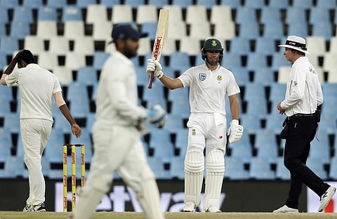 South Africa's batsman AB de Villiers, second right, raises his bat after reaching half century off India's bowler Jasprit Bumrah. (Photo | AP)