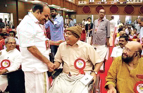 CPM state secretary Kodiyeri Balakrishnan welcoming former MLA and senior CPM leader Simon Britto at the party’s Ernakulam district convention in Kochi on Tuesday | K Shijith