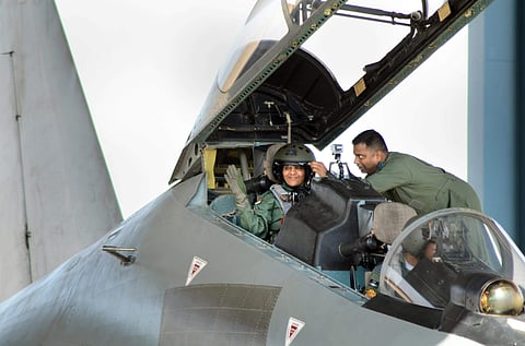 Defence Minister Nirmala Sitharaman waves from the cock-pit of IAF's Sukhoi-30 MKI plane before taking off for a sortie in Jodhpur on Wednesday. | PTI