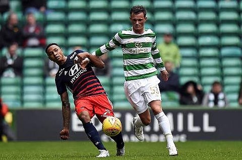 Celtic midfielder Liam Henderson (right) | Photo: AFP