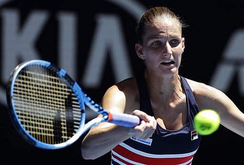 Karolina Pliskova of the Czech Republic makes a forehand return to Brazil's Beatriz Haddad Maia during their second round match at the Australian Open tennis championships in Melbourne | Photo: AP