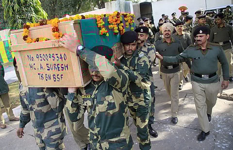Border Security Force personnel carry the coffin of Head Constable A Suresh, who was killed in Pakistani cross-border firing, in Jammu on Thursday | PTI