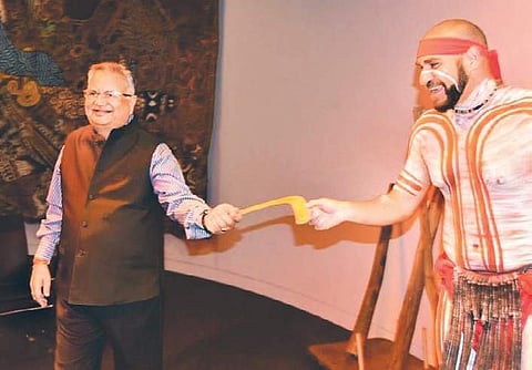 Chhattisgarh Chief Minister Raman Singh with an Aborigine performer during his ongoing visit to Australia.