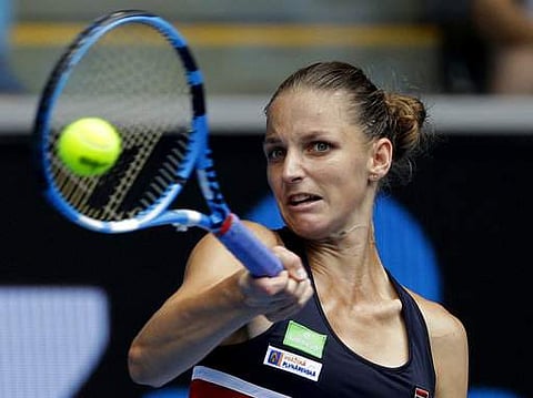 Karolina Pliskova of the Czech Republic makes a forehand return to compatriot Lucie Safarova during their third round match at the Australian Open tennis championships | Photo: AP