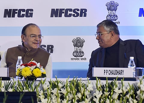 Union Minister for Finance and Corporate Affairs Arun Jaitley speaks with MoS for Corporate Affairs PP Chaudhary at the launch of National Corporate Social Responsibility CSR Data Portal and Corporate Data Portal in New Delhi on Friday. (PTI)