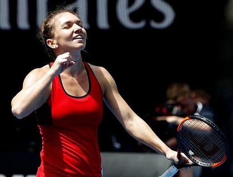 Romania's Simona Halep celebrates after defeating United States' Lauren Davis in their third round match at the Australian Open tennis championships | Photo: AP