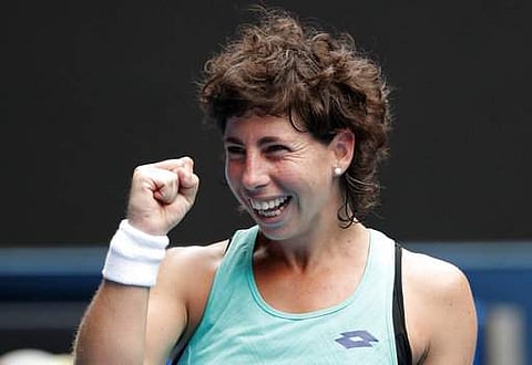 Spain's Carla Suarez Navarro celebrates after defeating Anett Kontaveit of Estonia in their fourth round match at the Australian Open tennis championships in Melbourne | Photo: AP