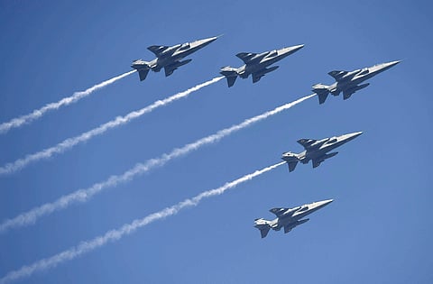Indian Air Force fighter planes flying past during the Republic day parade rehearsals at Rajpath in New Delhi on Saturday. | PTI