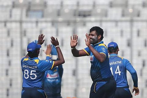Perera claimed four wickets with his medium-pace as Zimbabwe survived 44 overs after electing to bat first.  | Photo: AP