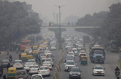 Vehicles drive through smog in New Delhi. (Photo | Reuters)