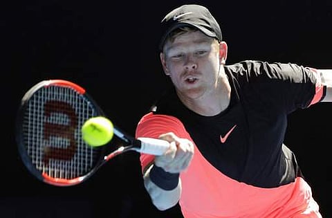Britain's Kyle Edmund makes foreman return to Bulgaria's Grigor Dimitrov during their quarterfinal at the Australian Open tennis championships in Melbourne. | AP