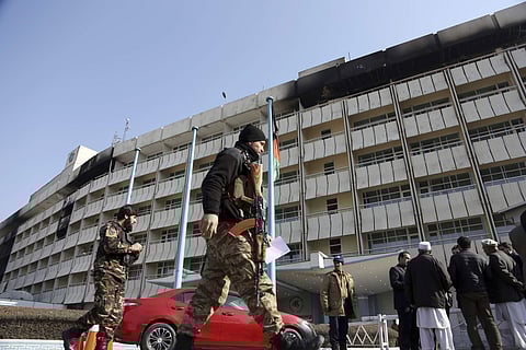 Afghan security personnel walk past the Intercontinental Hotel in Kabul (File | AP)