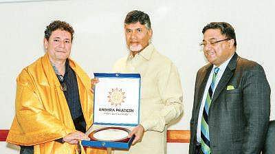 Chief Minister N Chandrababu Naidu with Pioneering Ventures chairman Ron Paul in Zurich on Monday  | Express