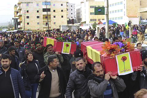 Kurdish mourners carry the coffins of people who were killed by Turkish shelling and airstrikes, during their funeral procession, in the Syrian Kurdish enclave of Afrin, Syria, Monday, Jan. 22, 2018. (Photo | Associated Press)