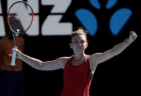 Romania's Simona Halep celebrates after defeating Karolina Pliskova of the Czech Republic in their quarterfinal at the Australian Open tennis championships in Melbourne. | AP