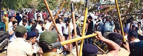 Police lathicharge BJP activists protesting the suicide of Kunduli gangrape victim at Sishu Bhawan square in Bhubaneswar on Tuesday | Express