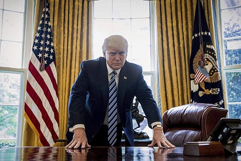 Donald Trump had dismissed the prospect of a trade war and said during the signing that 'a lot of manufacturers' will come to the United States to build solar plants. (File | Associated Press)
