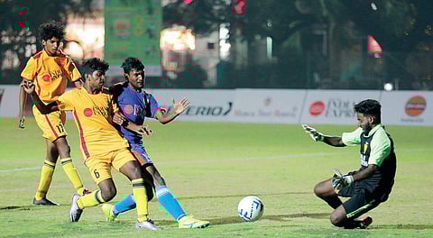Salbin, goalkeeper  of Maharaja’s College,  saving a shot against  MPMM SN College, Shoranur, during the Goal 2018 in Kochi on Tuesday. Maharaja’s won the match by 1-0 | Melton Antony