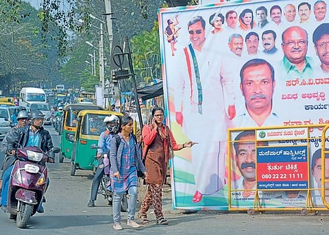 Political flexes block footpaths at HAL 2nd Stage  Pushkar V