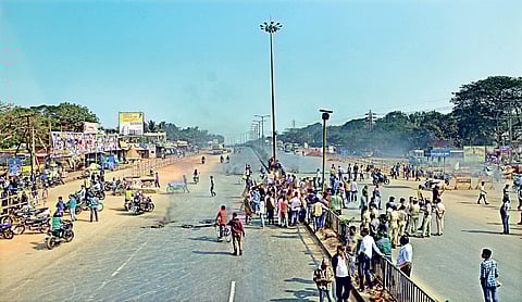 BJP activists staging a blockade at Khandagiri Square in Bhubaneswar on Wednesday during dawn-to-dusk Odisha bandh over suicide of Kunduli gang-rape victim | Biswanath Swain