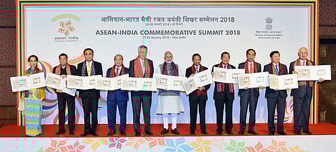 Prime Minister Narendra Modi with the ASEAN Heads of State / Governments and ASEAN Secretary General releases postal stamps to commemorate silver jubilee of India and ASEAN partnership at the ASEAN India Commemorative Summit in New Delhi on Thursday. | PT