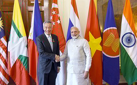 Prime Minister Narendra Modi greets his Vietnamese counterpart Nguyen Xuan Phuc at Rashtrapati Bhavan in New Delhi on Thursday. | PTI