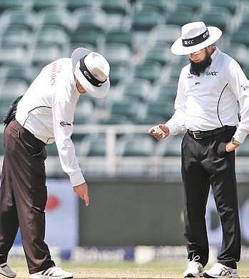 Umpires inspect the pitch on Day 3 of the third Test in Johannesburg | BCCI