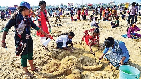 Participants sculpting turtles at the competition  Sunish P Surendran