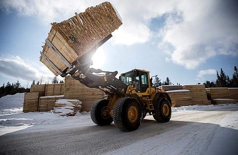 Softwood lumber is stacked at Groupe Crete, a sawmill in Chertsey, Quebec, Canada, January 17, 2018. (Reuters)