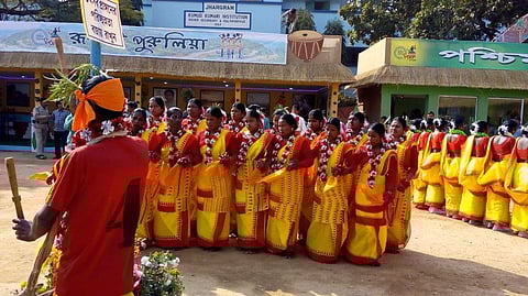 Tribes, dressed in their colorful traditional outfits, perform their cultural forms of dance at Jangalmahal Utsab | EPS