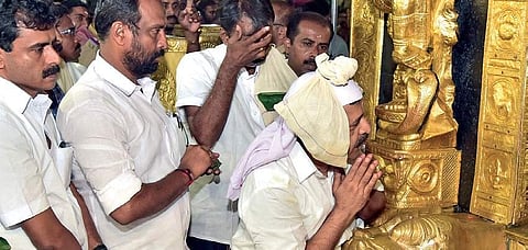 Opposition Leader Ramesh Chennithala offering prayers at the Sabarimala Lord Ayyappa temple on Tuesday