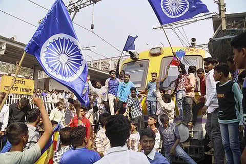 Dalit groups protesting at Thane railway station during the Maharashtra Bandh on Wednesday following clashes between two groups in Bhima Koregaon near Pune in Mumbai. (Photo | PTI)