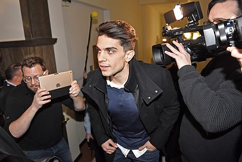 Dortmund's Marc Bartra of Spain arrives at the courtroom in Dortmund, Germany, to testify as witness at the trial against a man, charged with the attempted murder of Borussia Dortmund's soccer team. | AP