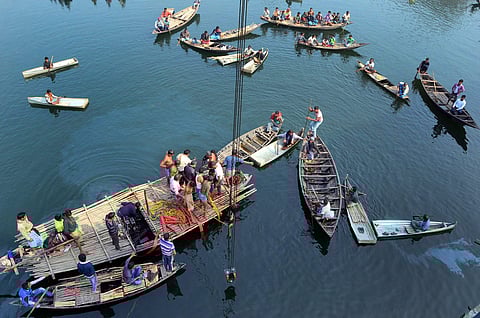 At least 36 people were killed and 11 people went missing after a bus skid off Balighat Bridge and plunged into Bhairab river near Daulatabad in Murshidabad district of West Bengal on 29th January. (Photo | PTI)