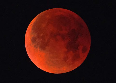 The moon is putting on a rare cosmic show. It's the first time in 35 years a blue moon has synced up with a supermoon and a total lunar eclipse. NASA is calling it a lunar trifecta: the first super blue blood moon since 1982. That combination won't happen