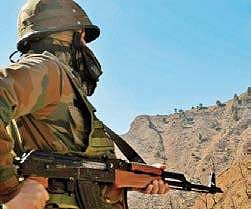 An army jawan keeps vigil at a forward post along the Line of Control in Jammu and Kashmir’s Poonch district. (File| PTI)
