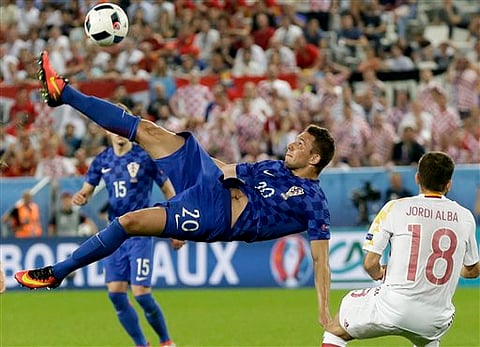 Croatia's Marko Pjaca goes for an overhead kick during the Euro 2016 Group D soccer match between Croatia and Spain (Photo | AP)