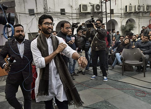 Gujarat Dalit leader Jignesh Mevani arrives to address a press conference at Press Club in New Delhi on Friday. | PTI