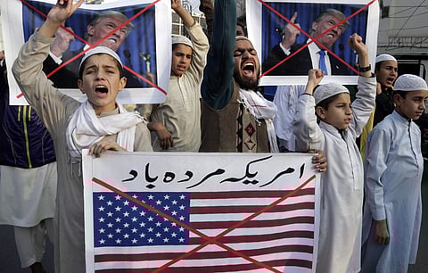 Pakistani religious students protest against US Presidnet Donald Trump for the suspension of security assistance | AP