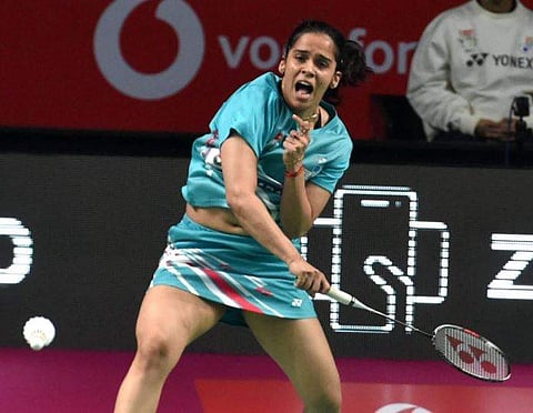 Saina Nehwal of Awadhe Warriors in actionaganist Mumbai Rockets during Premier Badminton League at BBD Badminton Academy in Lucknow on Thursday. | PTI