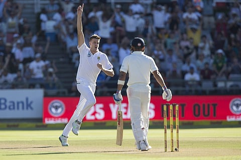 Morne Morkel celebrates the wicket of Indian skipper Virat Kohli on the Day 1 of  the India South Africa test. (Photo: PTI)