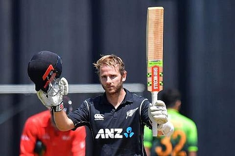 New Zealand's captain Kane Williamson celebrates his century during the first ODI between New Zealand and Pakistan at the Basin Reserve in Wellington on January 6, 2018. | AFP