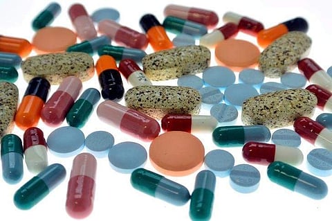 Pharmaceutical tablets and capsules are arranged on a table in a photo illustration shot September 18, 2013. (File Photo | Reuters)