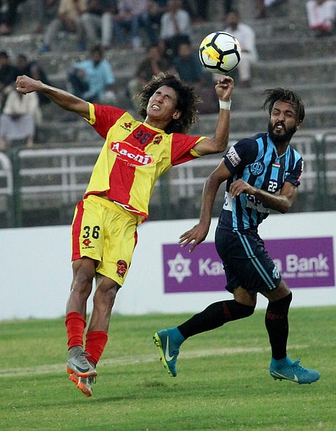 Kivi Zhimomi of Gokulam FC Yellow in action against Kamal Preet Singh of Minerva Punjab FC in the Hero I League football competition. (Photo: PTI)