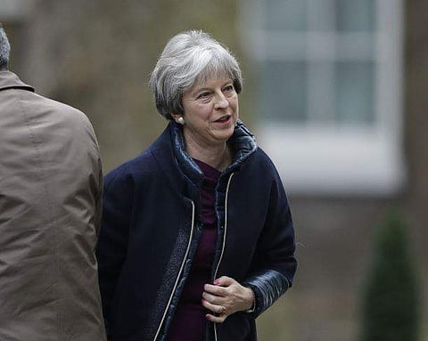 Britain's Prime Minister Theresa May returns to 10 Downing Street in London, Monday, Jan. 8, 2018, ahead of an expected Cabinet reshuffle.  | AP