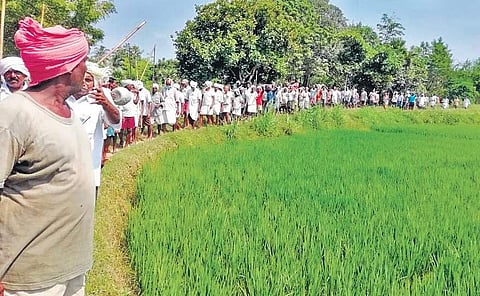 Farmers protesting against SEZ at Ramanakkapet village in East Godavari district on Sunday. I Express Photo Services