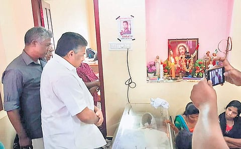 Saji Cherian MLA paying his last respects to Jineesh Jeron.
