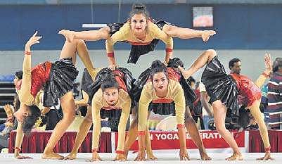 Indian teams perform at the free flow Yoga dance event of the Asian Yoga Sports Championships in Thiruvananthapuram on Sunday