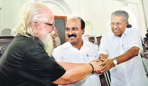 Chief Minister Pinarayi Vijayan greets former ISRO scientist S Nambi Narayanan in Thiruvananthapuram. Revenue Minister E Chandrasekharan looks on | Vincent Pulickal